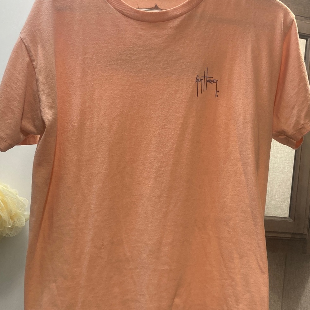 Guy Harvey Light Orange Short Sleeve Tee has one small hole posted a pic of it